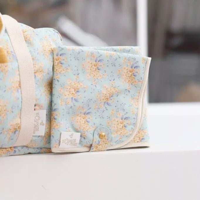 Matelas à langer nomade – Chic et pratique pour les sorties - Cocons & merveilles